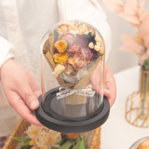 Preserved flowers in glass dome