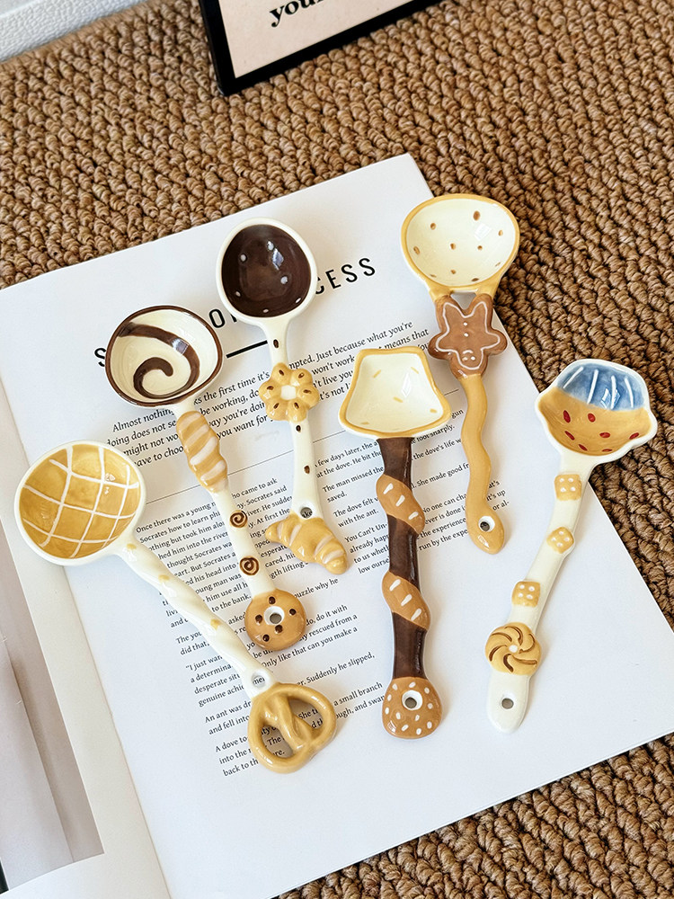 Cute ceramic dessert spoon with a playful food-inspired handle design
