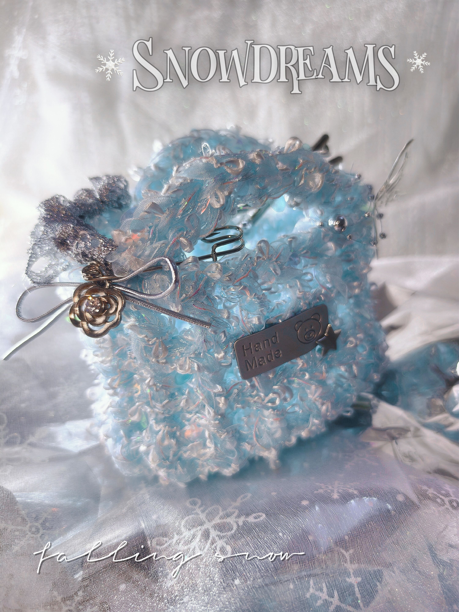 Iridescent blue handmade art yarn featuring translucent fibers, shimmering accents, ribbons and layered decorative textures.
