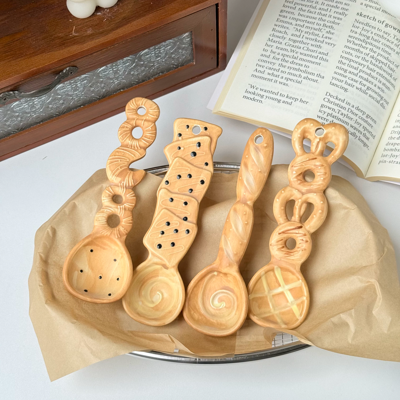 Food-inspired ceramic spoons with playful long-handle designs