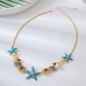 Ocean-inspired starfish necklace with turquoise starfish, seashells and pearl accents