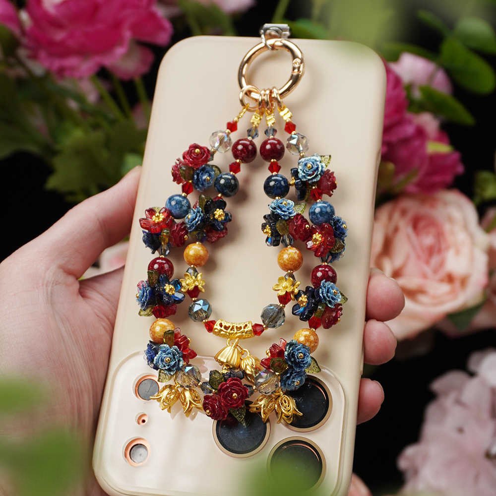 Vintage flower phone charm with colorful beads, rose details and gold-tone accents