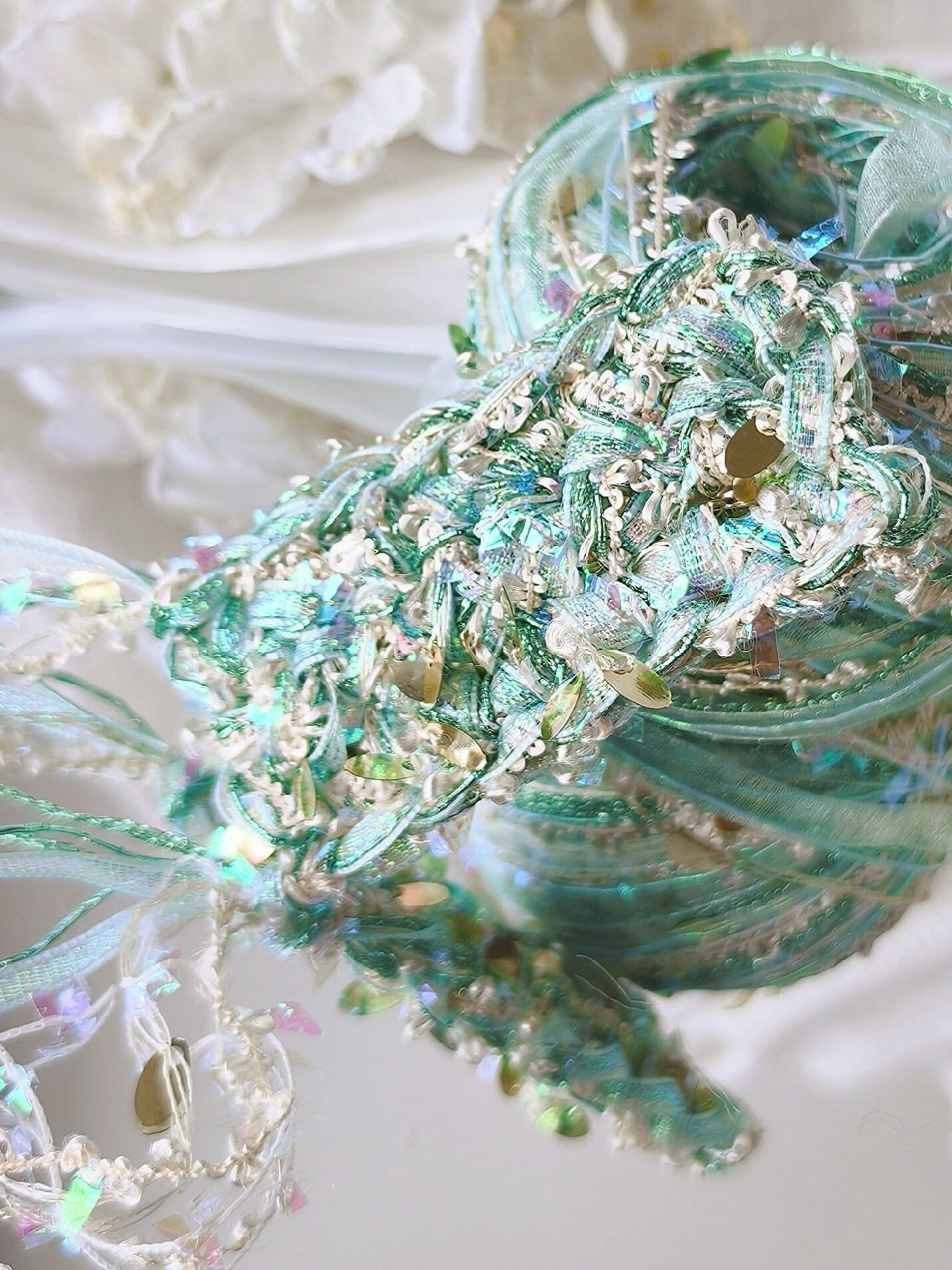 Green art yarn with shimmering decorative details
