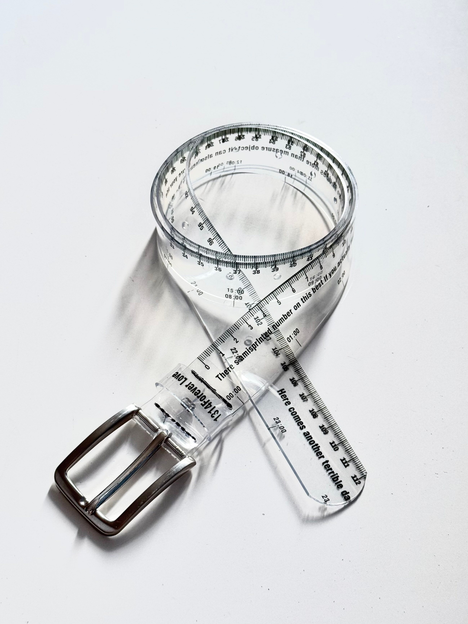 Transparent ruler belt with clear design and metallic buckle